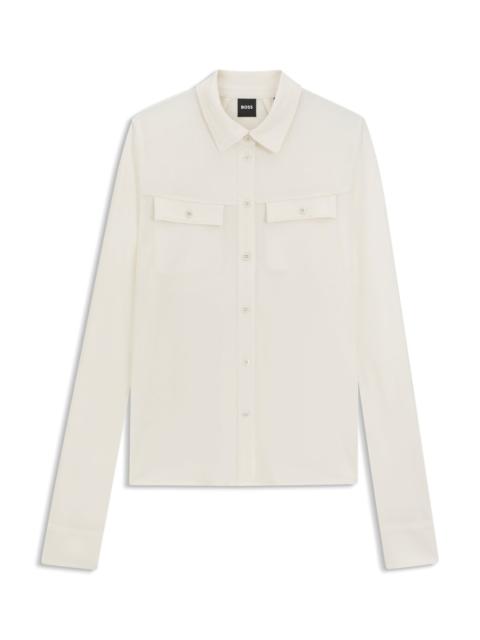 SLIM-FIT BLOUSE IN MATTE JERSEY