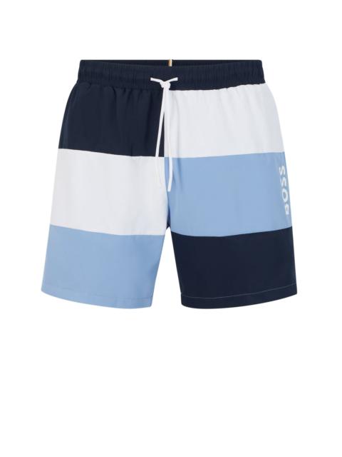COLOUR-BLOCKED SWIM SHORTS IN QUICK-DRYING MATERIAL