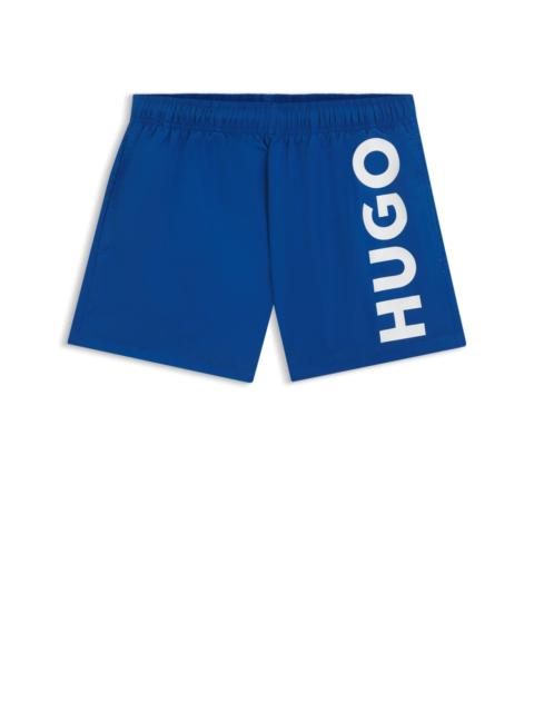 QUICK-DRY SWIM SHORTS WITH VERTICAL LOGO PRINT