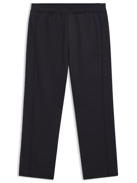 REGULAR-FIT TRACKSUIT BOTTOMS WITH QUILTED JACQUARD