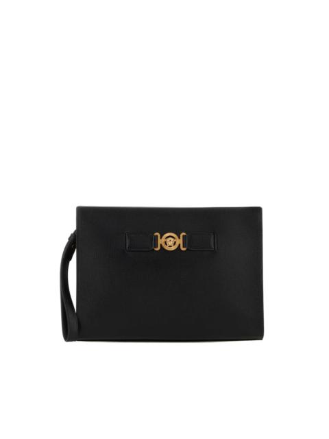 Medusa leather clutch bag