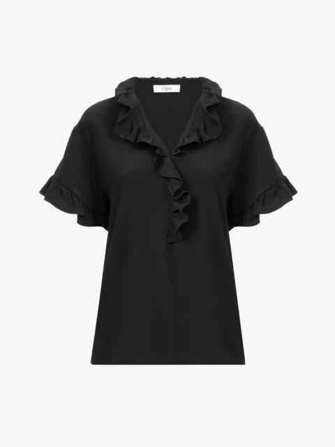 SHORT-SLEEVE RUFFLE TOP IN CRÊPE DE CHINE