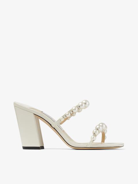 Amara 85
Latte Nappa Leather Mules with Pearl Embellishment