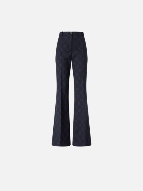 TROUSERS WITH A GEOMETRIC AND FLORAL MOTIF