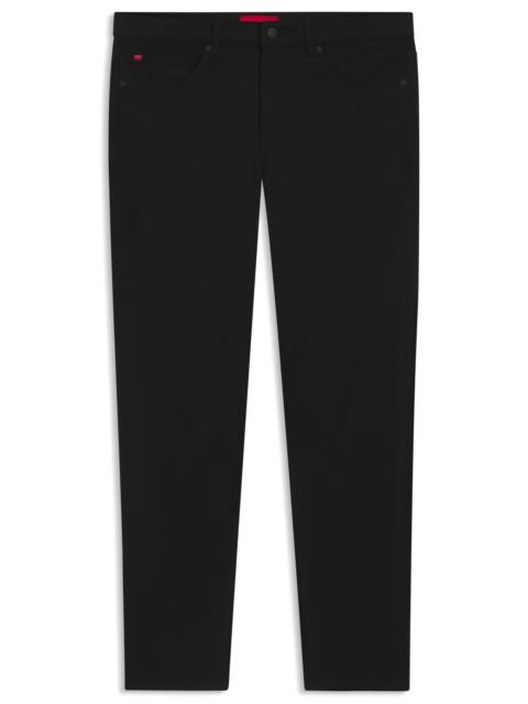 EXTRA-SLIM-FIT JEANS IN BLACK SATIN-TOUCH DENIM