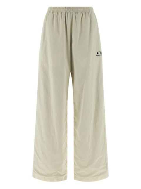 wrinkled-effect logo-embroidery trousers