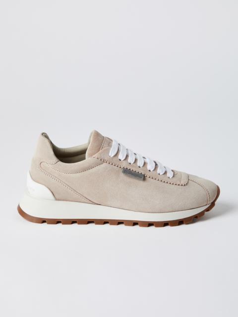 Suede runners with shiny tab