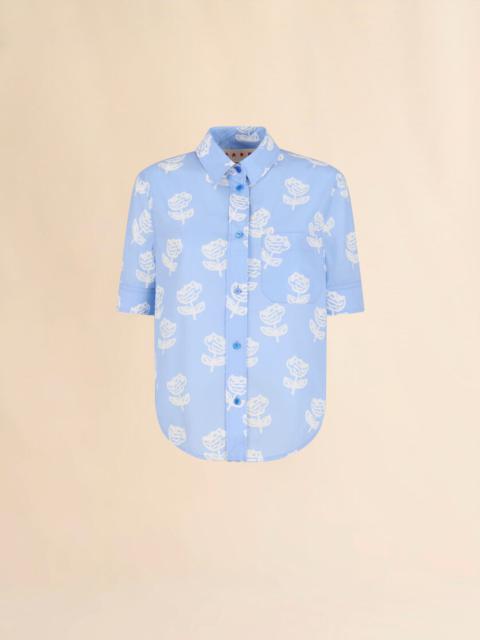 LIGHT BLUE POPLIN SHORT-SLEEVE SHIRT WITH SPRAYED ROSES PRINT