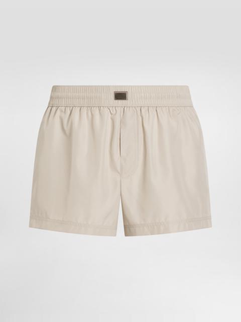 Short swim trunks with tag