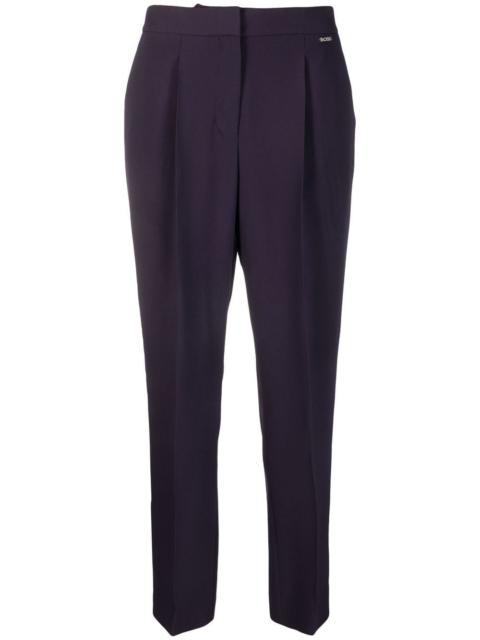 pleated tailored trousers