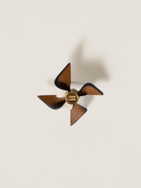 Leather pinwheel brooch