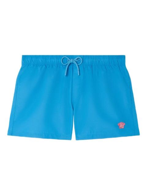 Medusa-embroidered swim shorts