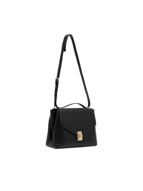 flap-front ring-detail tote bag