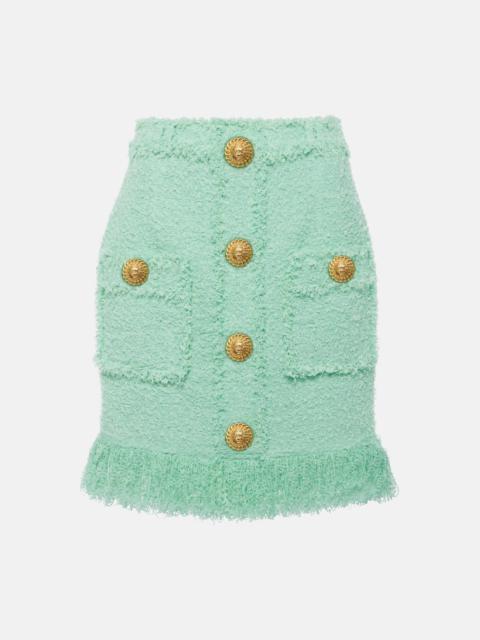 Fringed tweed miniskirt