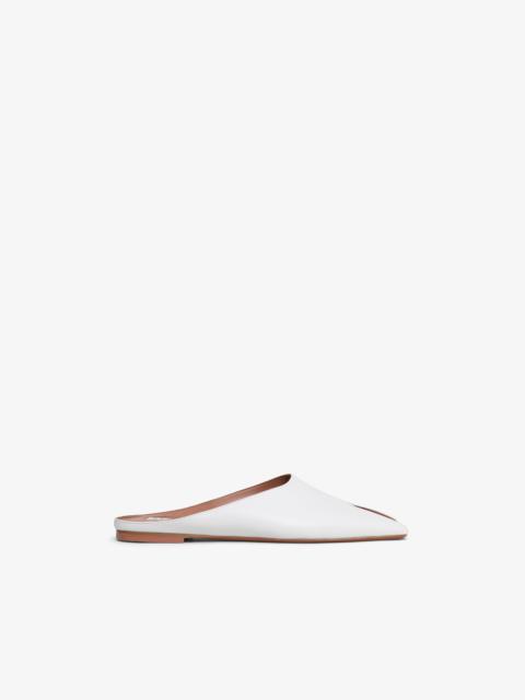 SPIKE FLAT MULES IN CALFSKIN