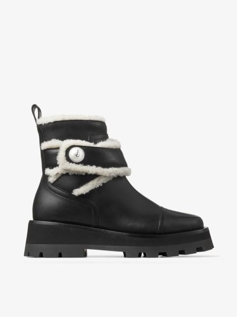 Meena Flat
Black Shiny Calf Leather Ankle Boots with Shearling