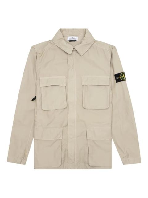 Compass-badge multi-pocket jacket