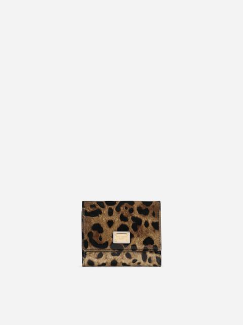 Polished calfskin wallet with leopard print