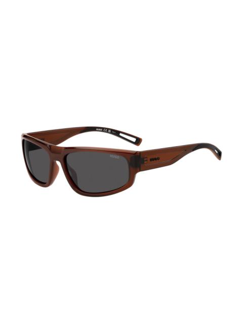 BROWN-ACETATE SUNGLASSES WITH CUT-OUT DETAILS
