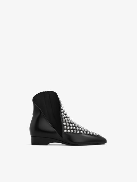 ASYMETRIC ANKLE BOOTS IN GLOSSY CALFSKIN WITH STUDS