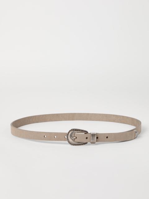 Reversed leather belt with tip