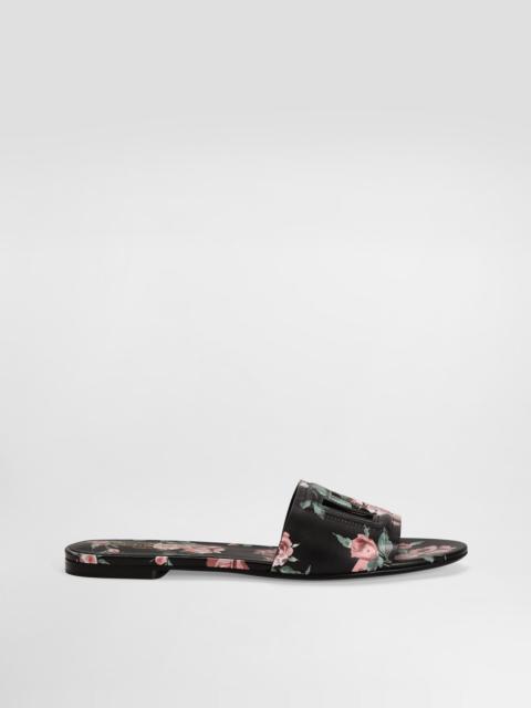 Calfskin flat slippers with rose print