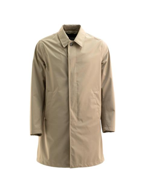 buttoned raincoat