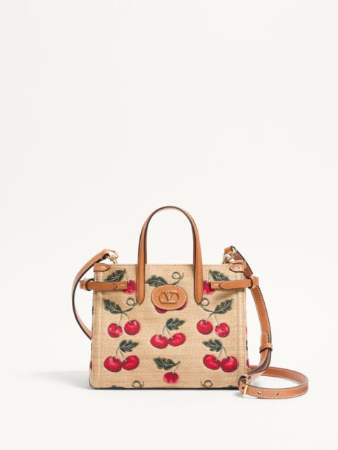 VALENTINO GARAVANI ANTIBES SMALL SHOPPING BAG IN JACQUARD RAFFIA WITH CHERRYFIC PATTERN