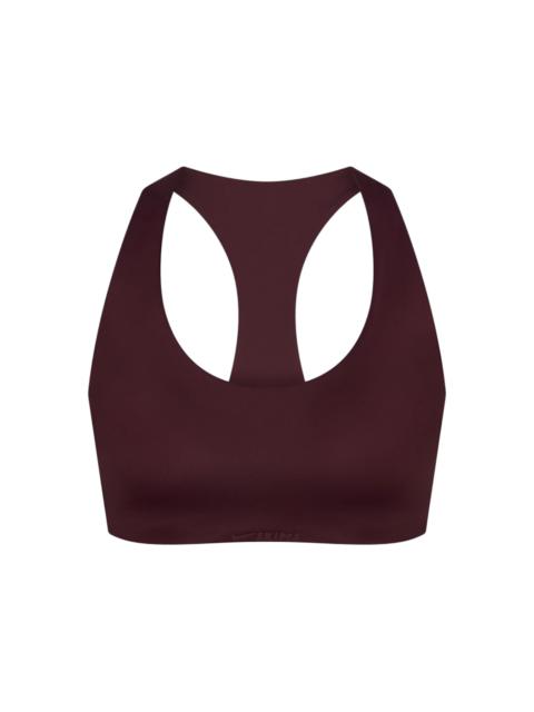 Nike x SKIMS Women's Shine Racer Back Bra Currant