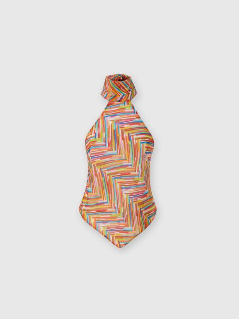 Sleeveless turtleneck top in printed cotton and silk blend