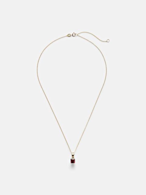 10kt gold charm necklace with garnet
