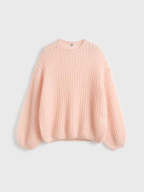 Puffed knit bloom