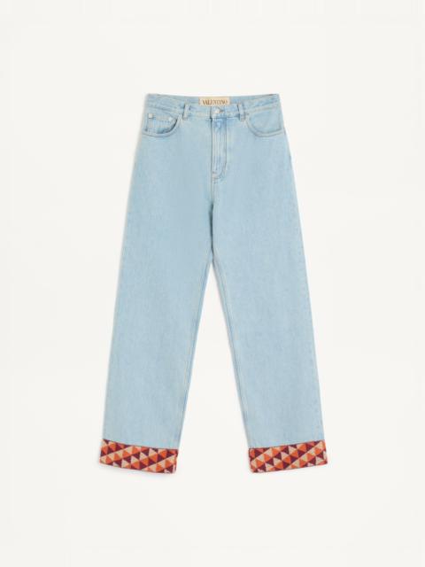 DENIM PANTS WITH JACQUARD HEM