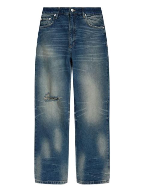 frayed-knee jeans