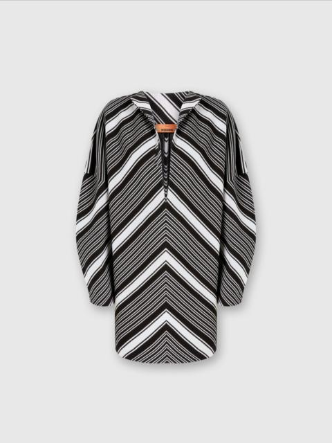 Mini-dress with oversized sleeves and plunging V-neckline