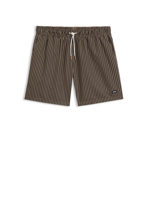 STRIPED SWIM SHORTS WITH LOGO DETAILS