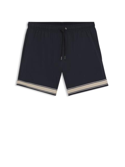 DRAWSTRING SWIM SHORTS IN STRETCH FABRIC WITH TAPE TRIM
