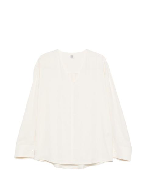 V-neck long-sleeved top