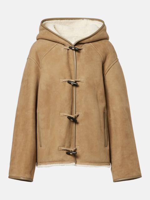Reversible leather and shearling jacket