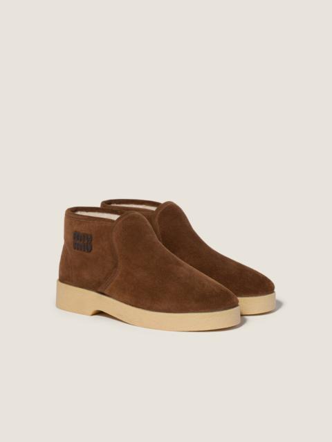 Suede and shearling slip-on booties