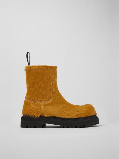 Dark yellow long calf hairboots