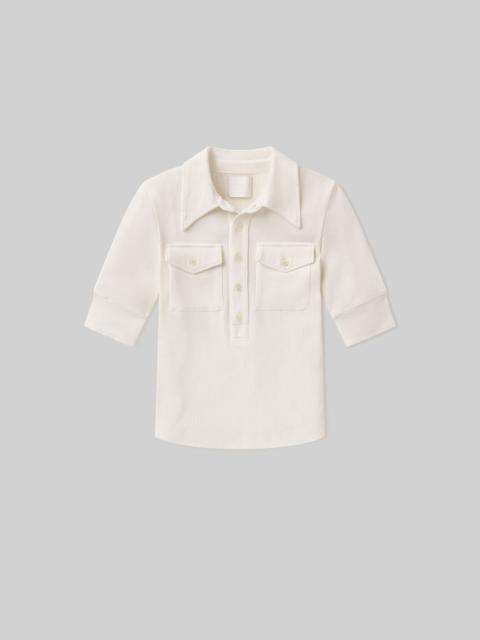 Amina Polo Shirt
In Pashmina