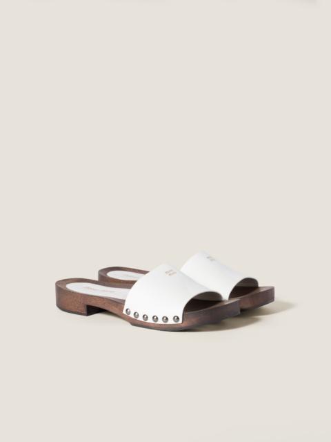 Patent leather clogs