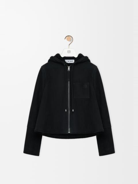 Hooded jacket in shearling