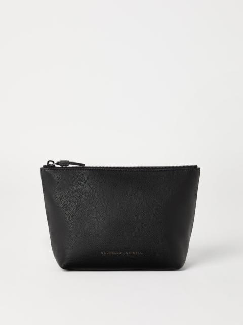 Grained leather pouch with shiny zipper pull