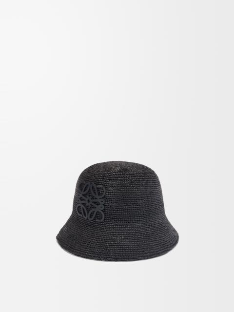 Bucket hat in raffia and calfskin