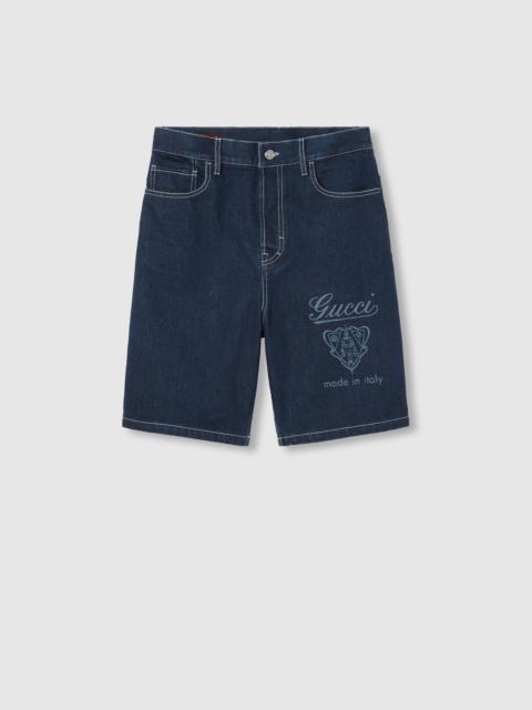 Lasered denim shorts