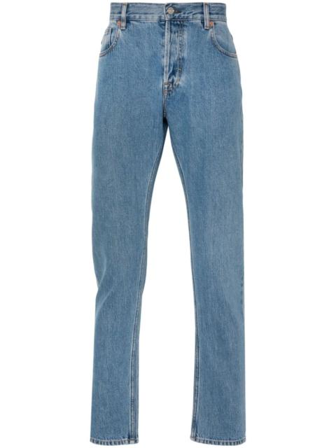 Web-stripe tapered jeans