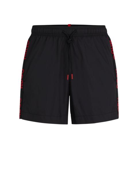 FULLY LINED SWIM SHORTS WITH LOGO TAPE