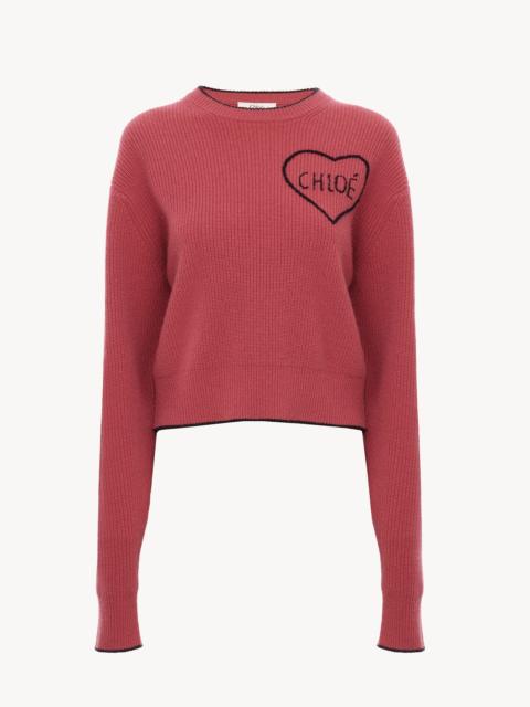 CROPPED FITTED LOGO SWEATER IN A WOOL KNIT